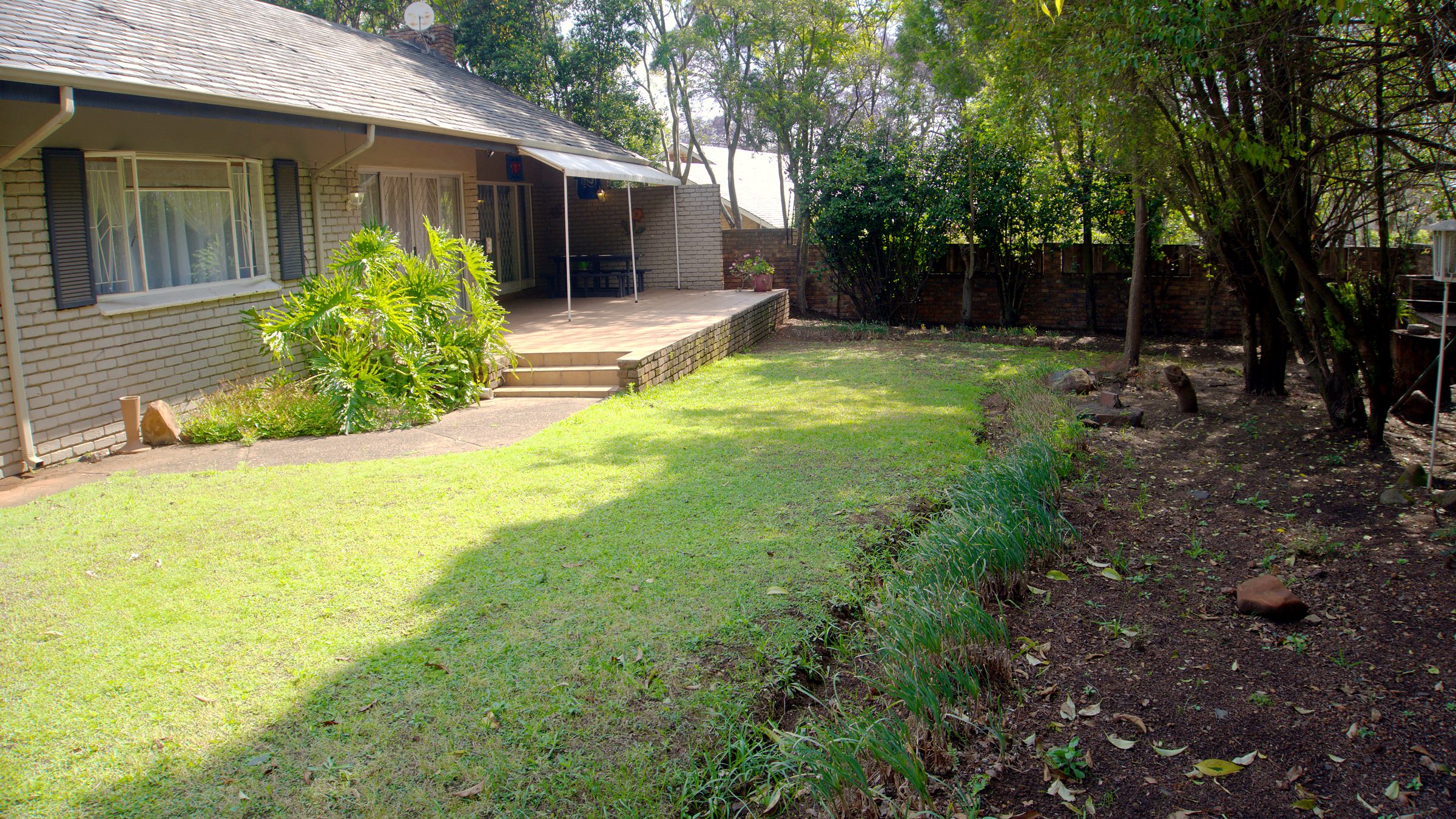 The back garden and covered stoep at 61 Mackenzie Street, Brooklyn